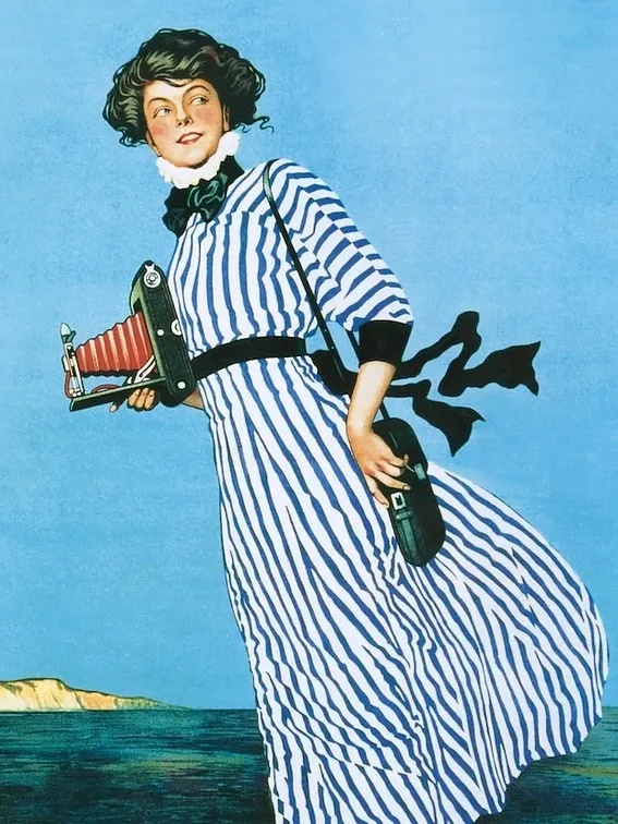 A young girl in wide stripes in a Kodak advertisement